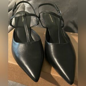 Black slingback heels by Anthropologie size 8.